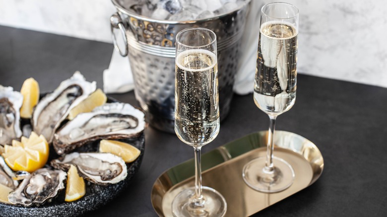 Champagne flutes and oysters