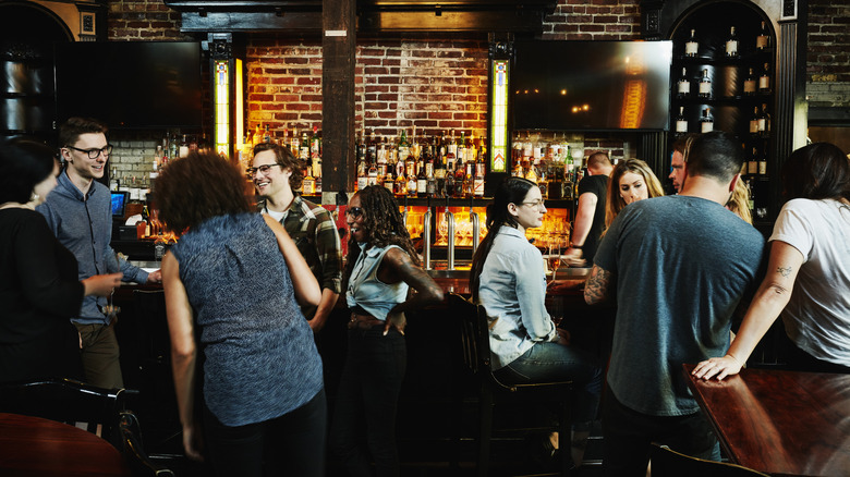 Happy hour bar scene, interior