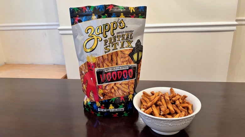 Bowl of Zapp's Voodoo Pretzel Stix next to bag