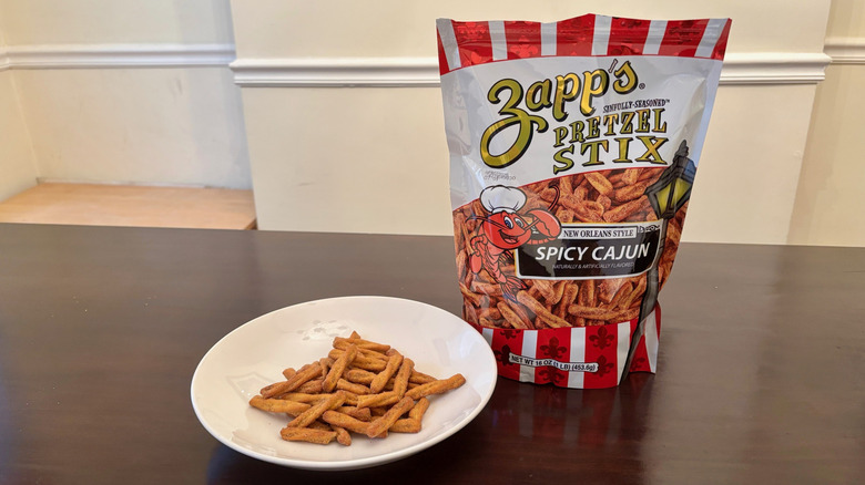 Bag Zapp's Pretzel Stix and bowl with pretzels next to it