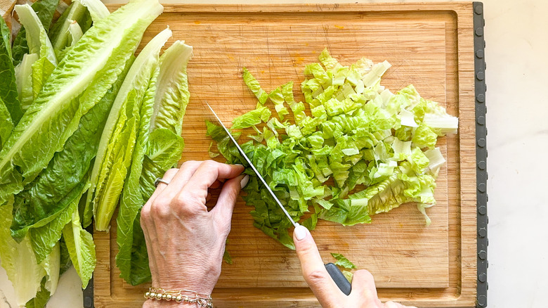 chopped romaine on board