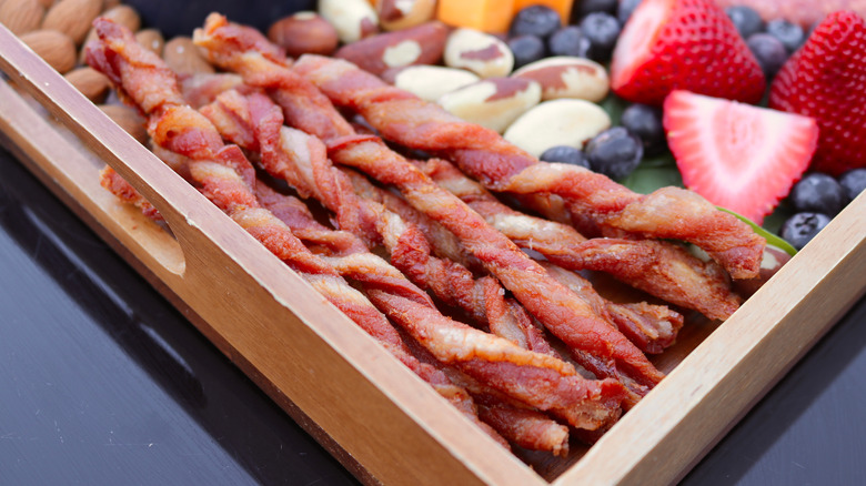 Twisted bacon with fruit and nuts