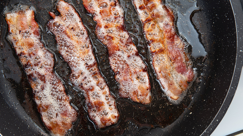 Bacon on a sizzling cooktop