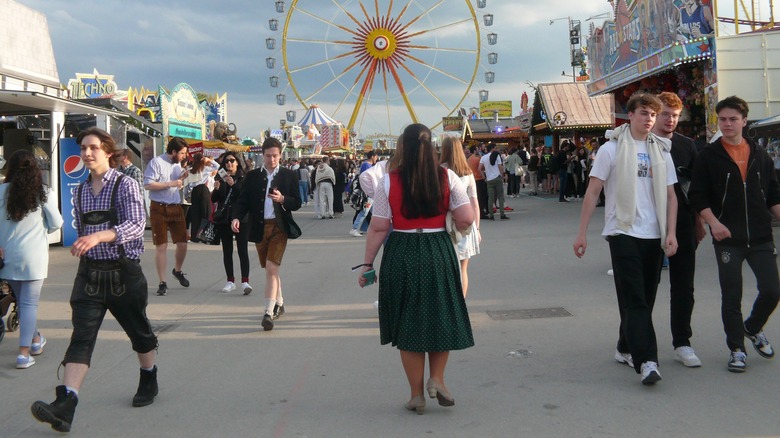 people walking on Oktoberfest grounds