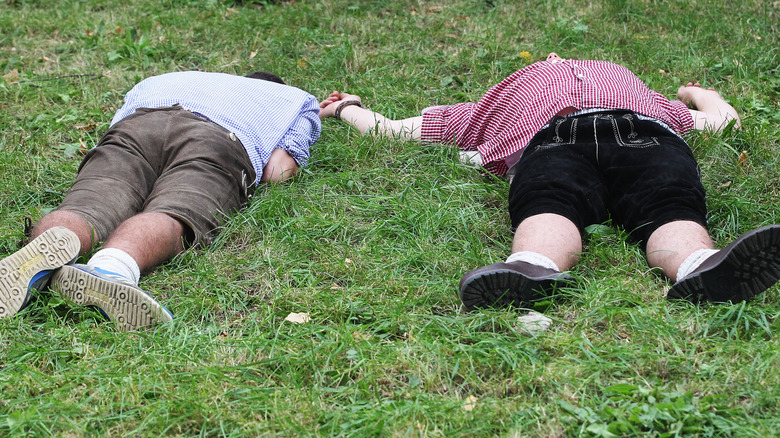 men passed out at Oktoberfest