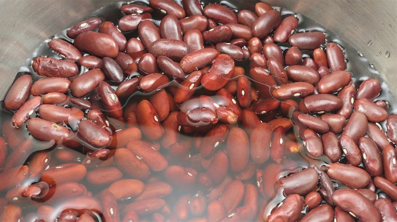 red beans soaked in a pot of water