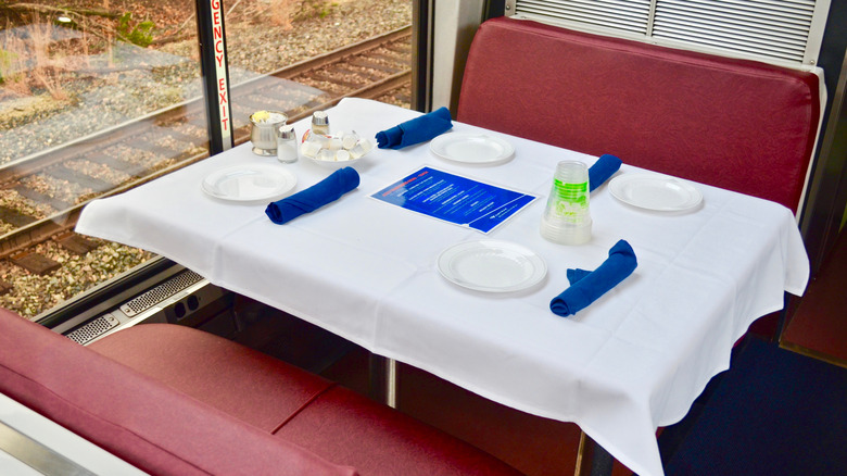 person dining in observation lounge