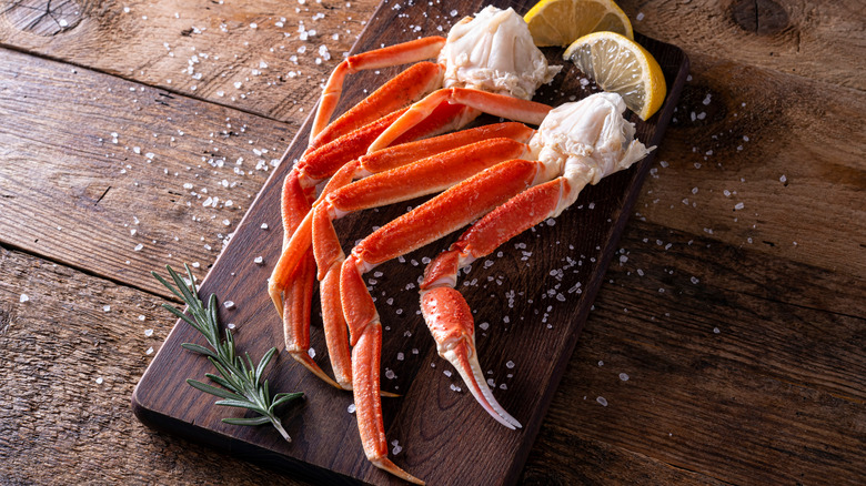 Cooked snow crab legs wood 