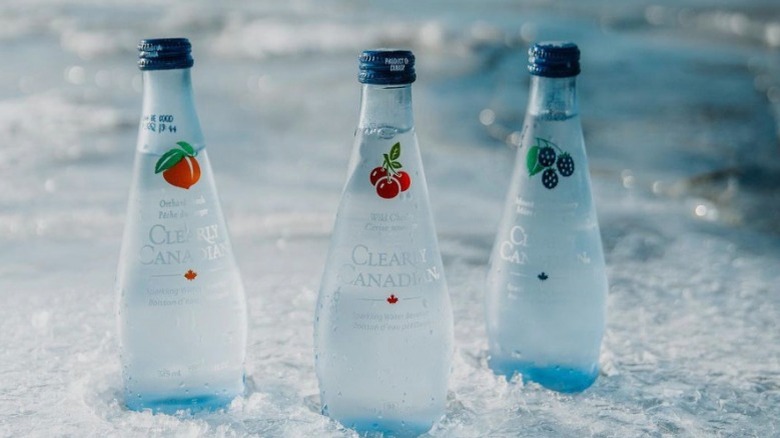 Three bottles in the snow