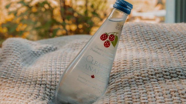 A bottle on a blanket