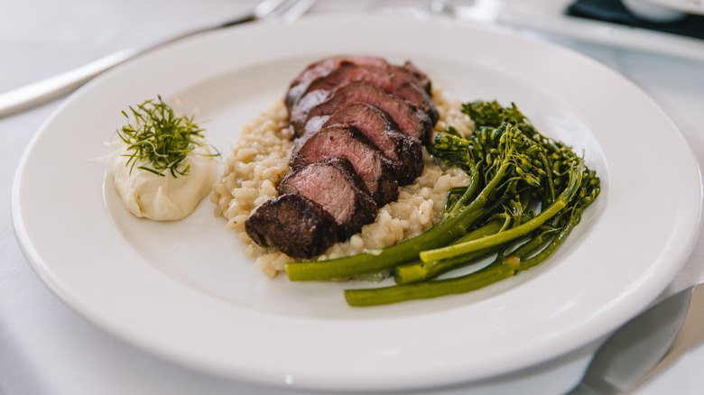 Elk with risotto and broccolini