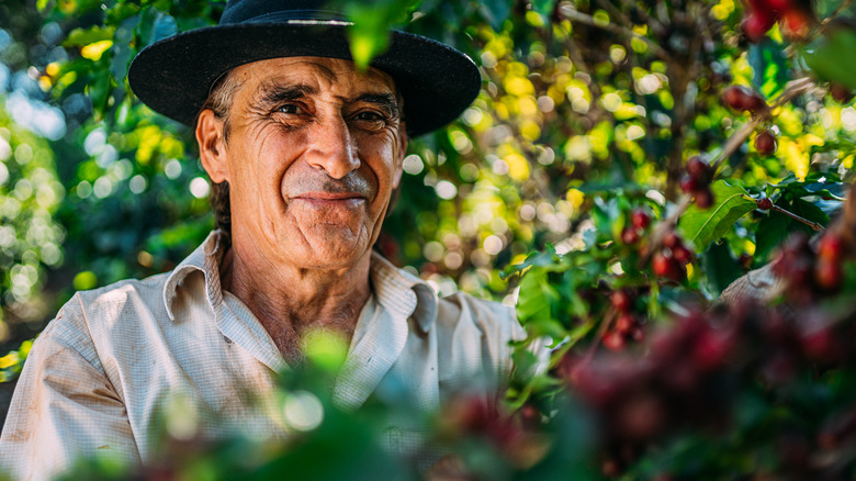 Farmer smiles at camera