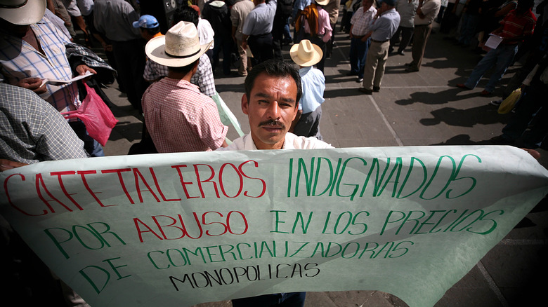 Protester holding sign