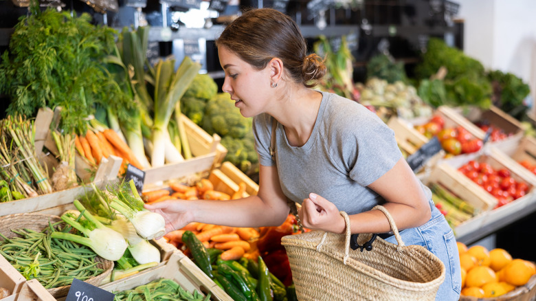 Customer buying fresh fennel