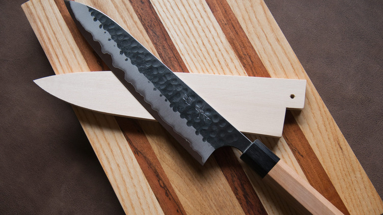 Knife with wooden saya