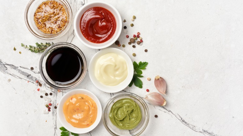 Small condiment bowls on table