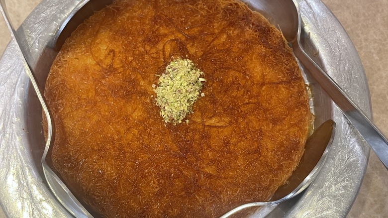 Large knafeh in metal dish