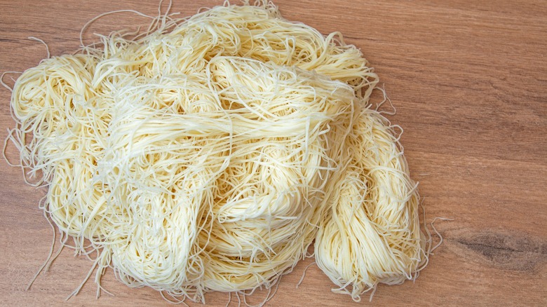 Uncooked kataifi pastry strands