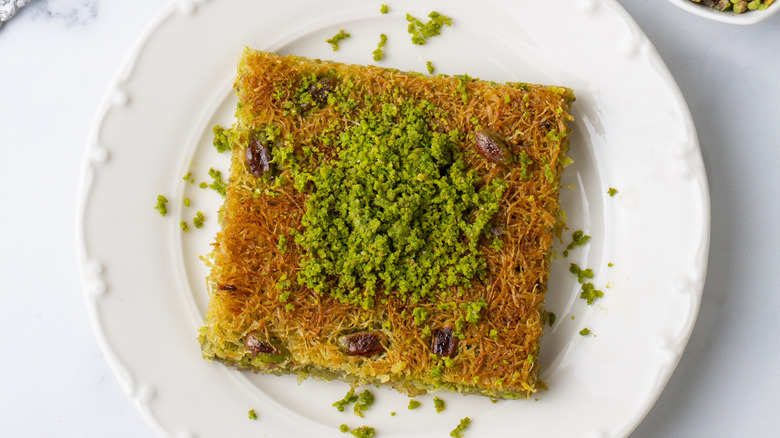 Knafeh square topped with pistachios