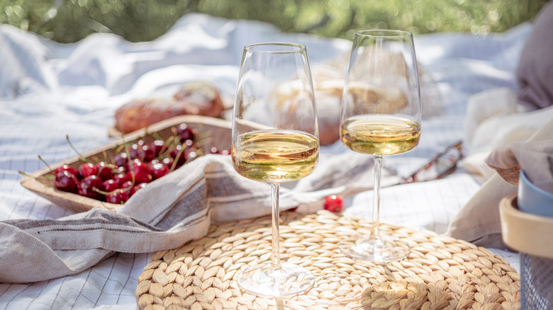 summer picnic with glasses of Pinot Grigio wine