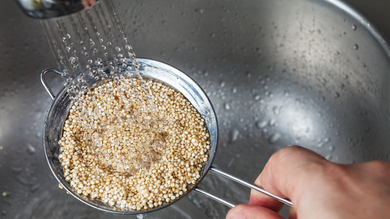 Quinoa being rinsed