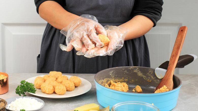 making arancini from leftover rice