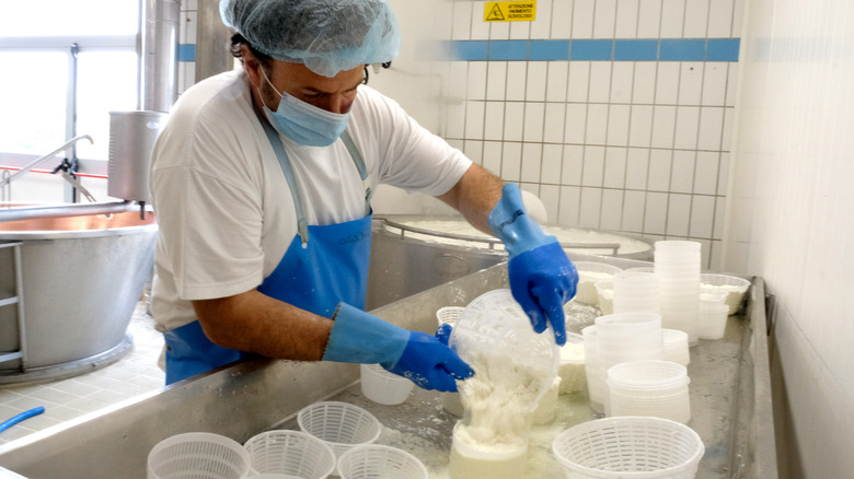 ricotta being produced