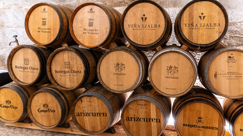 wine barrels with riojan producer labels