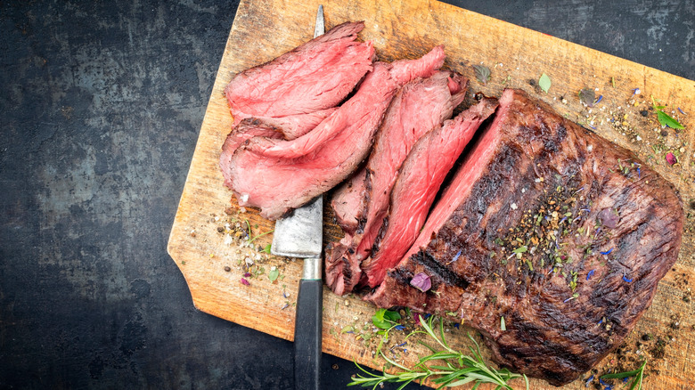 Perfectly cooked steak on cutting board