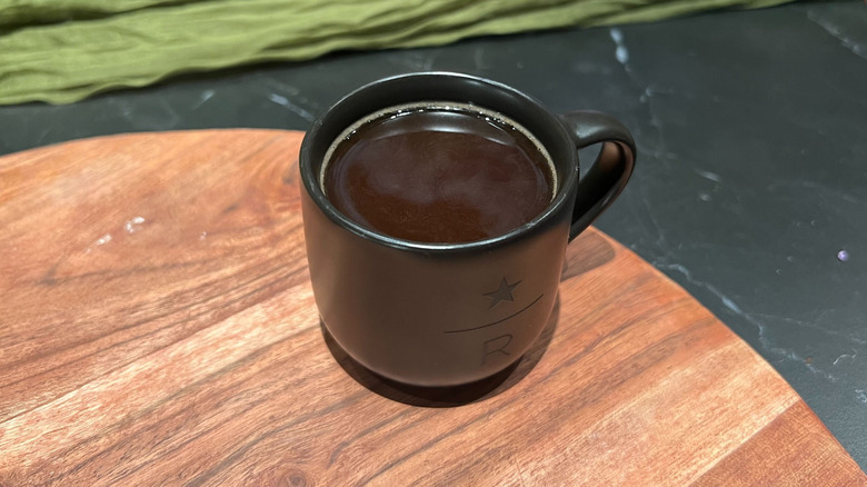 A mug of Starbucks Sunsera Blend on a wooden cutting board