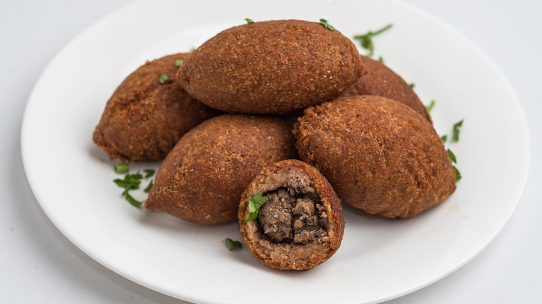 Kibbeh stacked on plate