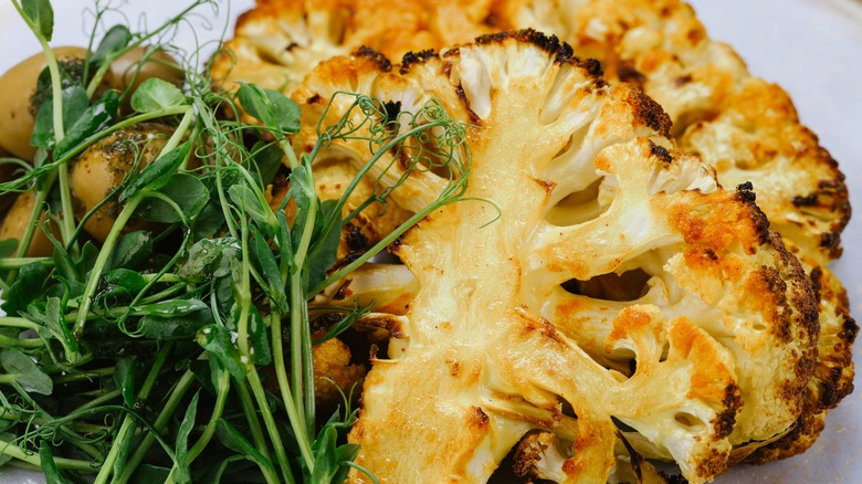 Grilled cauliflower with greens