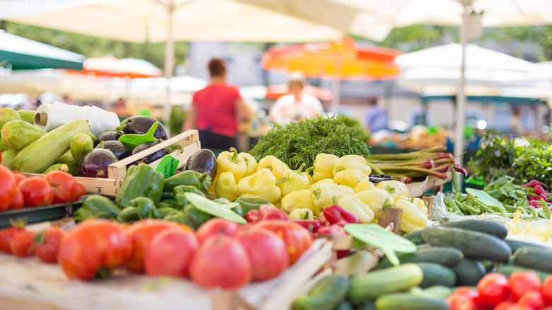 Farmers market stand with vegetables