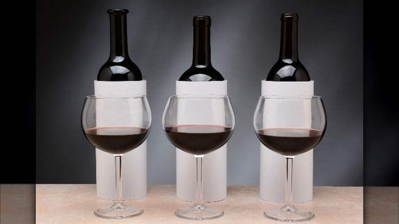 Blank wine bottles and glasses 