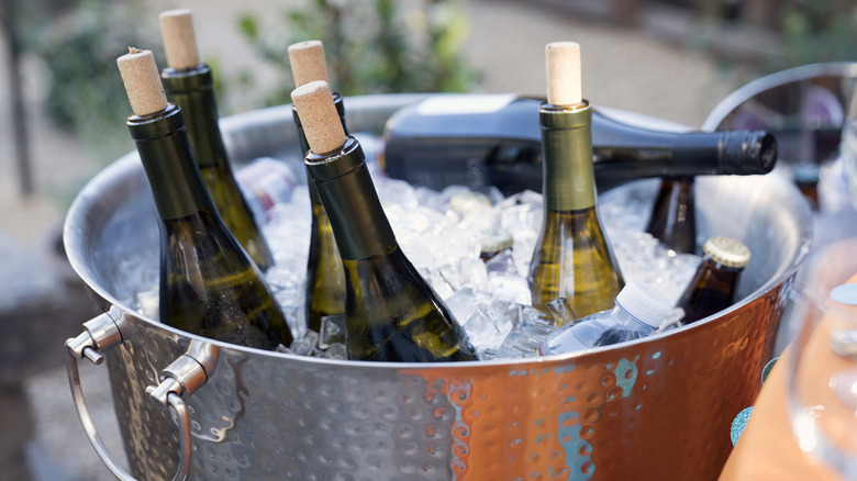 Bucket of wine bottles