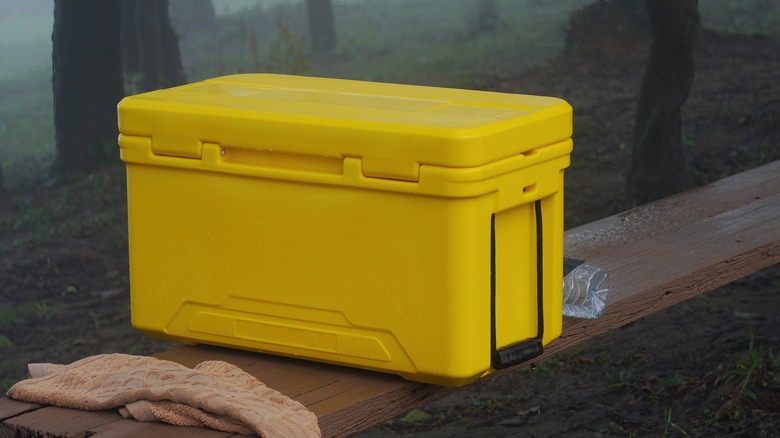 Yellow cooler on bench