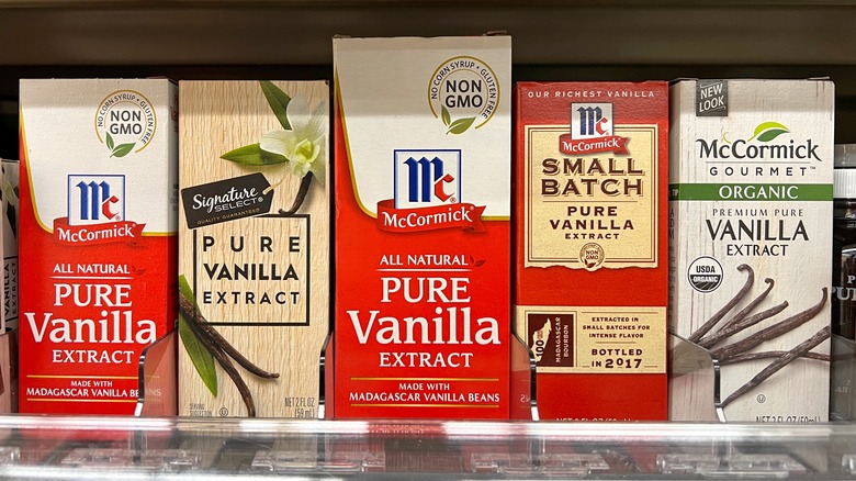 Boxes of vanilla extracts on a shelf