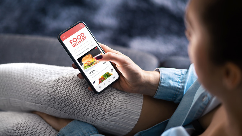 woman ordering food with app