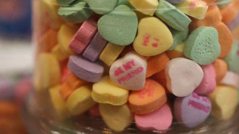 A jar of candy conversation hearts