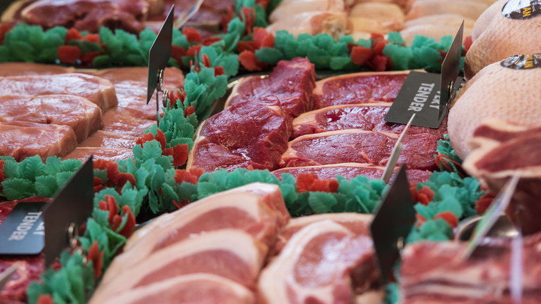 steaks at meat counter