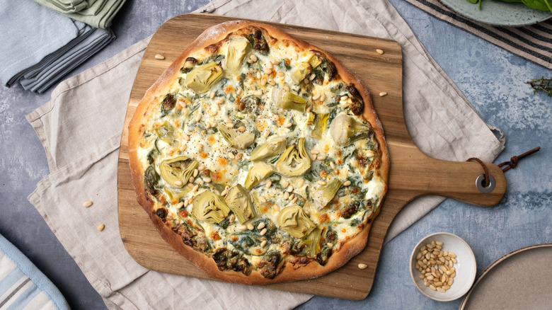 extra cheesy spinach artichoke pizza