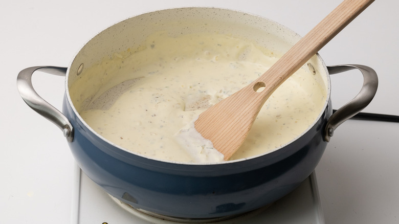 creamy cheesy sauce in pan