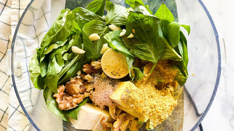 Pesto ingredients in food processor 