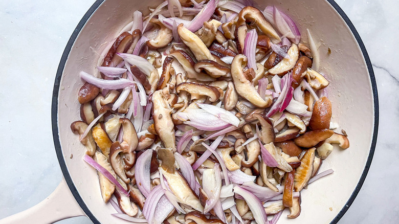 mushrooms and shallots in skillet