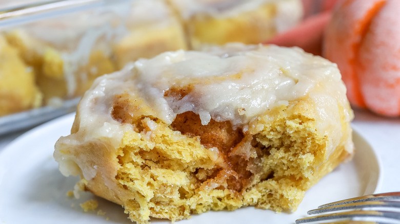 frosted pumpkin cinnamon roll