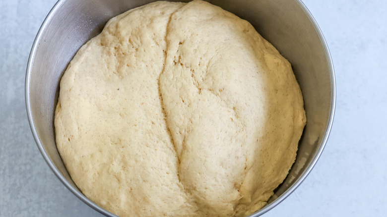 risen dough in bowl