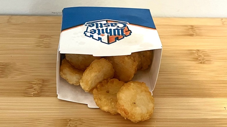 White Castle hash browns sit on a table.