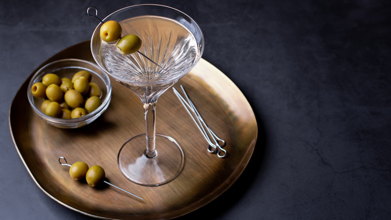 martini and olives on copper platter