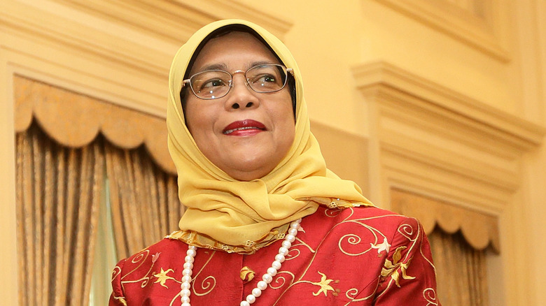 Halimah Yacob looking right