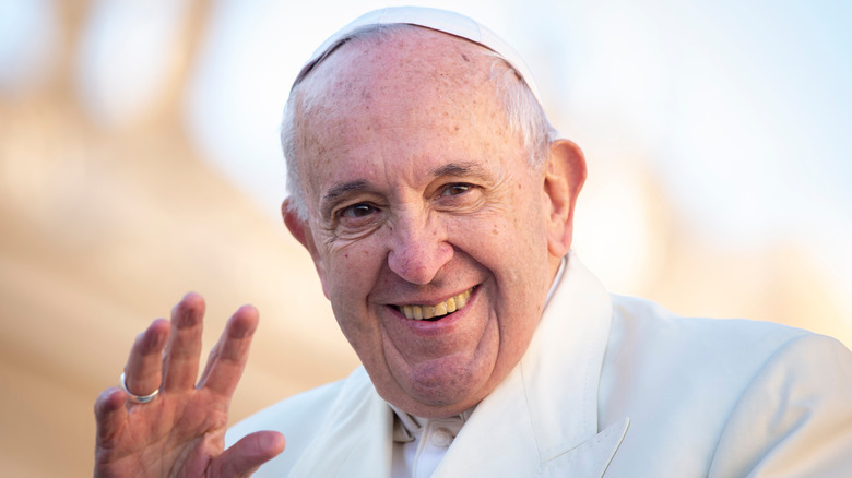 Pope Francis smiling and waving 